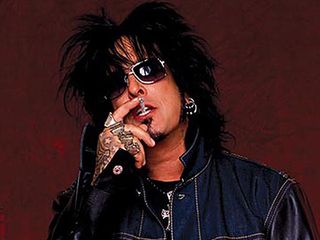 Nikki Sixx smoking a cigarette (or weed)
