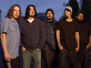 Deftones are recording without bassist Cheng (second from left)