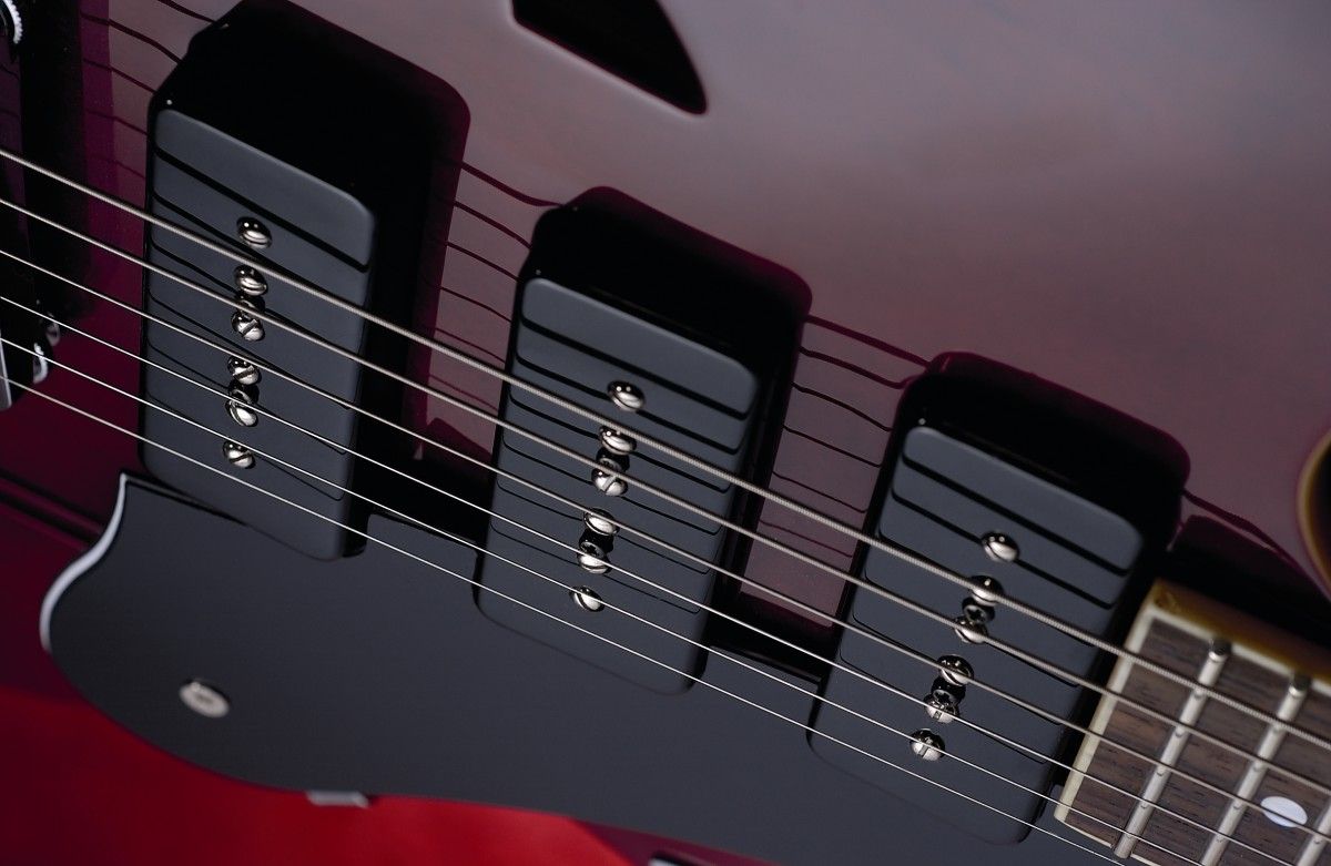 Each pickup has a volume control.