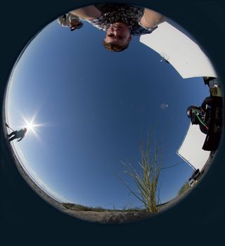 Use a fish-eye lens and a panohead to capture a number of HDR spheres from the location