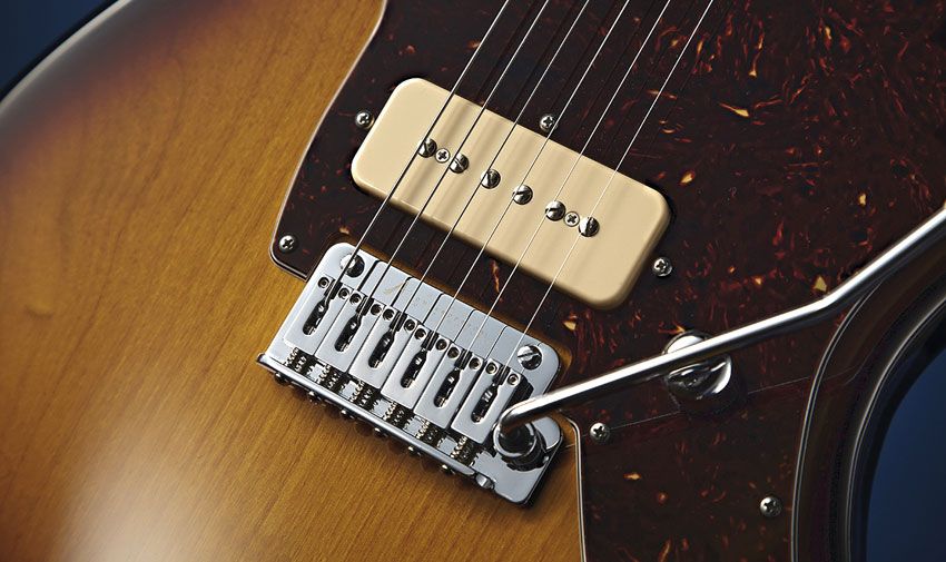 While the shape is Jazzmaster-esque, the vibrato unit is far less temperamental