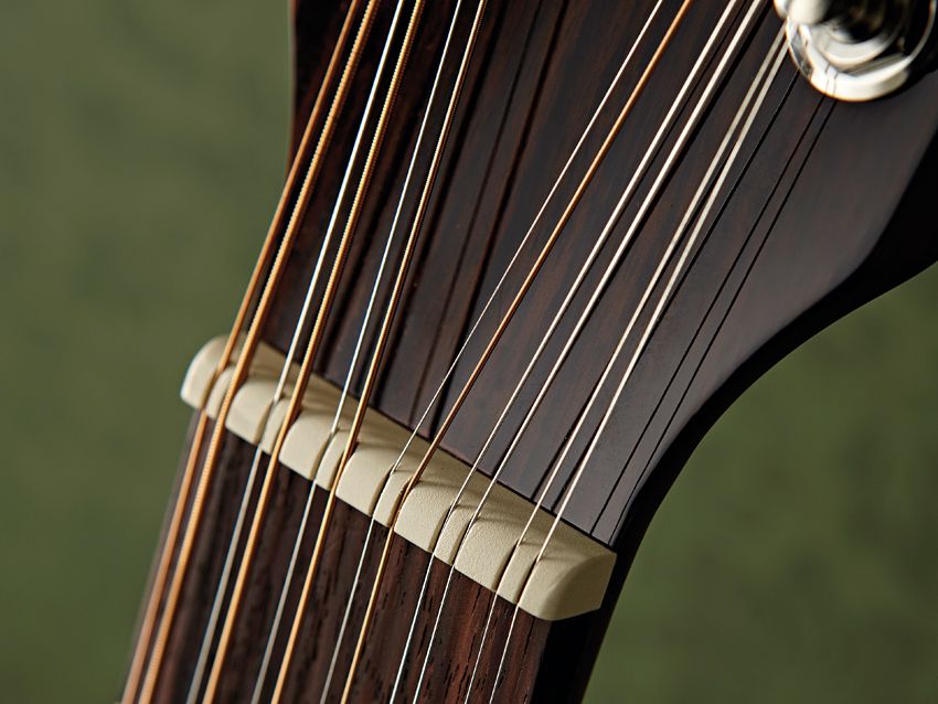 All those strings need tuners, and as such the D-125-12 is a bit top-heavy.