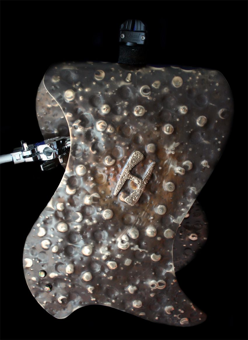 A 1/2" hole drilled into the centre of the fold allows the Hybrid to mount on an existing cymbal stand