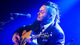 Justin Furstenfeld strums a Guild acoustic during a solo performance last April
