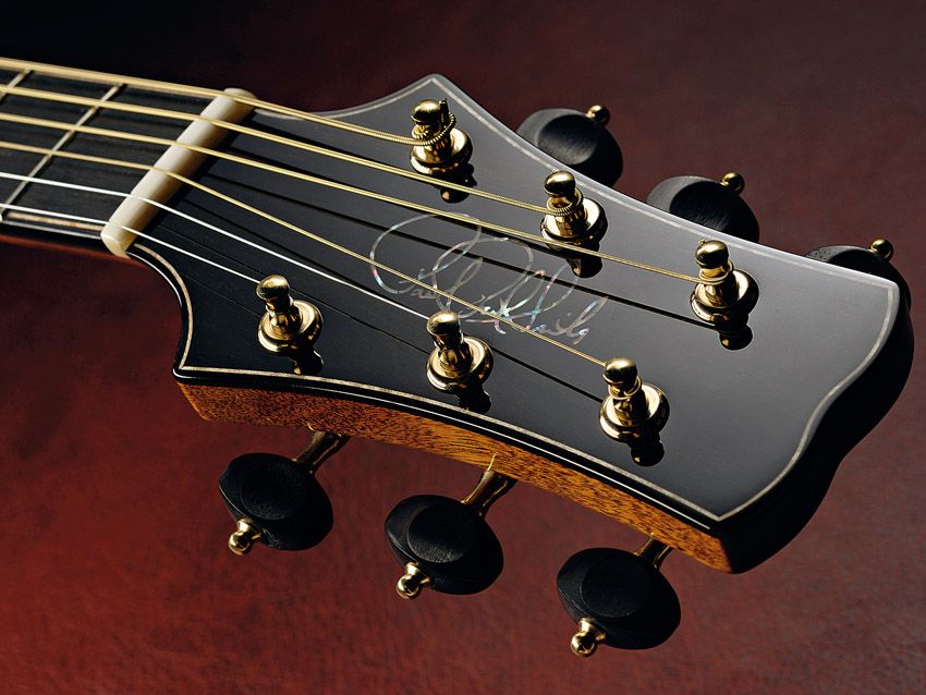 The neck and headstock is a single piece of mahogany.