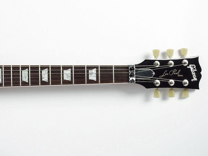 The neck profile is wide and thin rather than 'meaty and clubby'