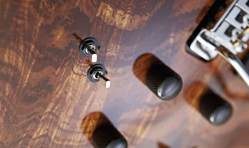 The controls and mini switches hold the key to this guitar's multi-voice capability