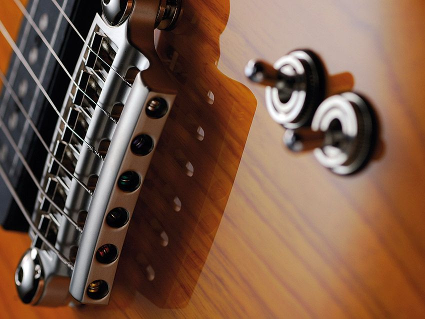 Each pickup has it's own three-way mode switch: clean, crunch and dirty.