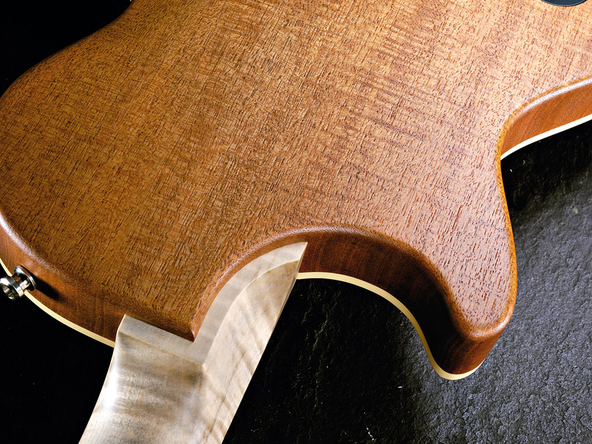 The unusual neck joint looks uncomfortable, but it's excellent.