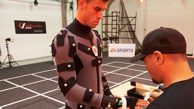 Bale suits up