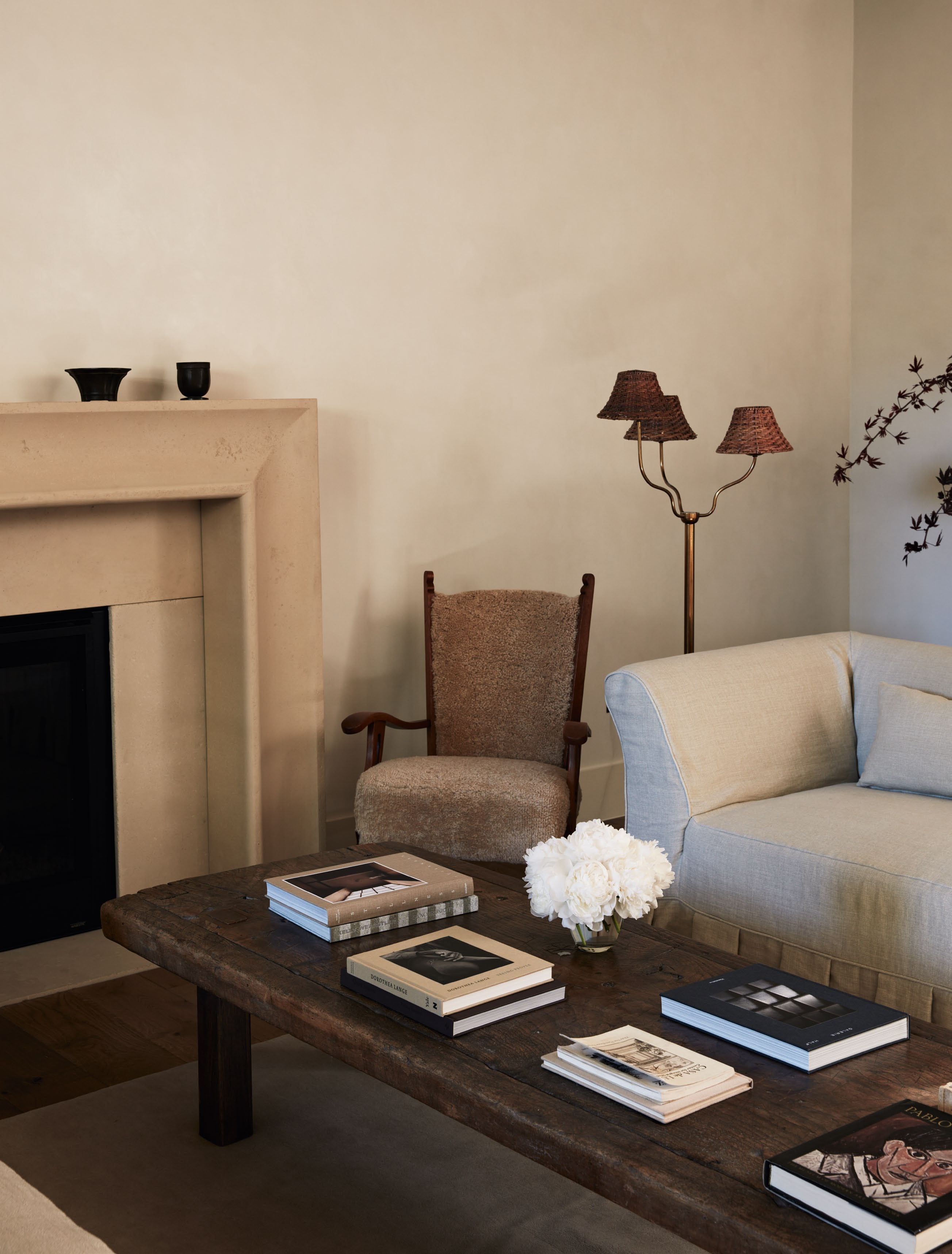 a room with an antique coffee table, with a more traditional, classic style