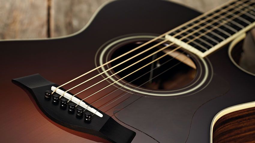 There's a very dark brown, gloss-finished top with a brighter orange 'sun' in the centre