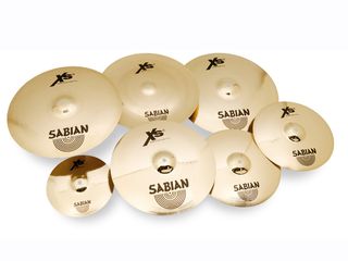 The cymbals have a golden colour and are polished to a shining gleam, top and bottom.