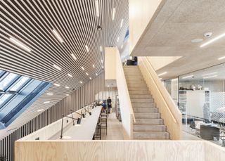 Tingbjerg Library and Culture House, Copenhagen, Denmark features an impressive circulation system with inspiring angles