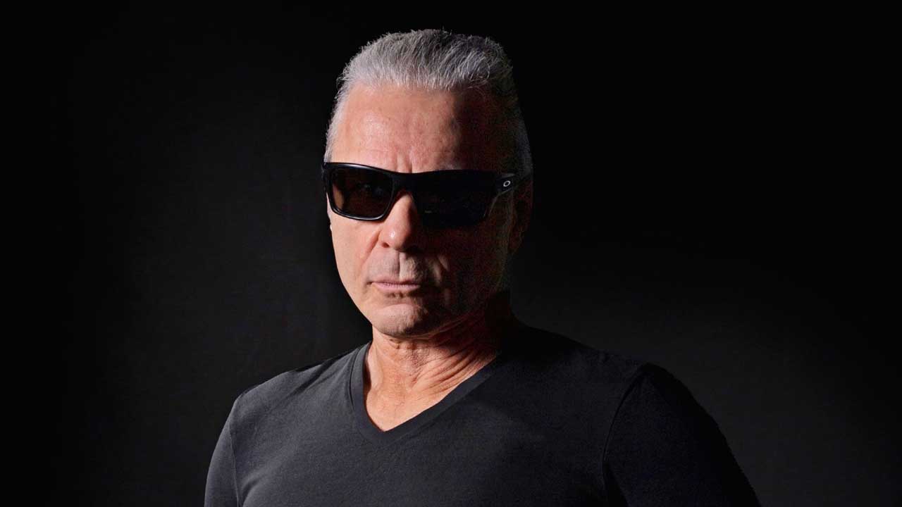 Bruce Dickinson studio portrait, in sunglasses