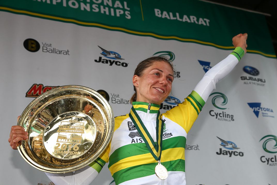 Katrin Garfoot with her green and gold jersey