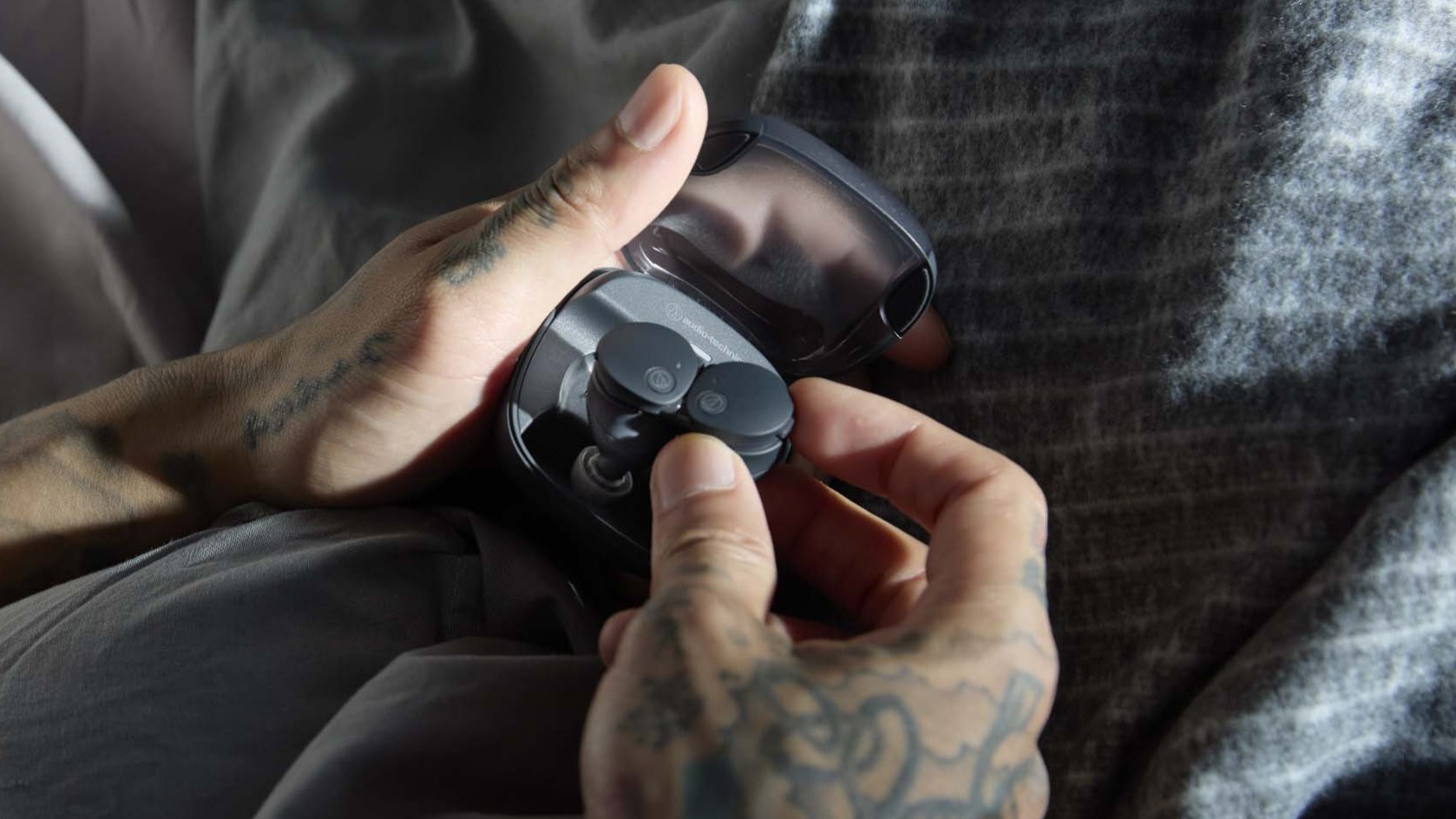 Audio-Technica ATH-CKS50TW2 held in the hand 