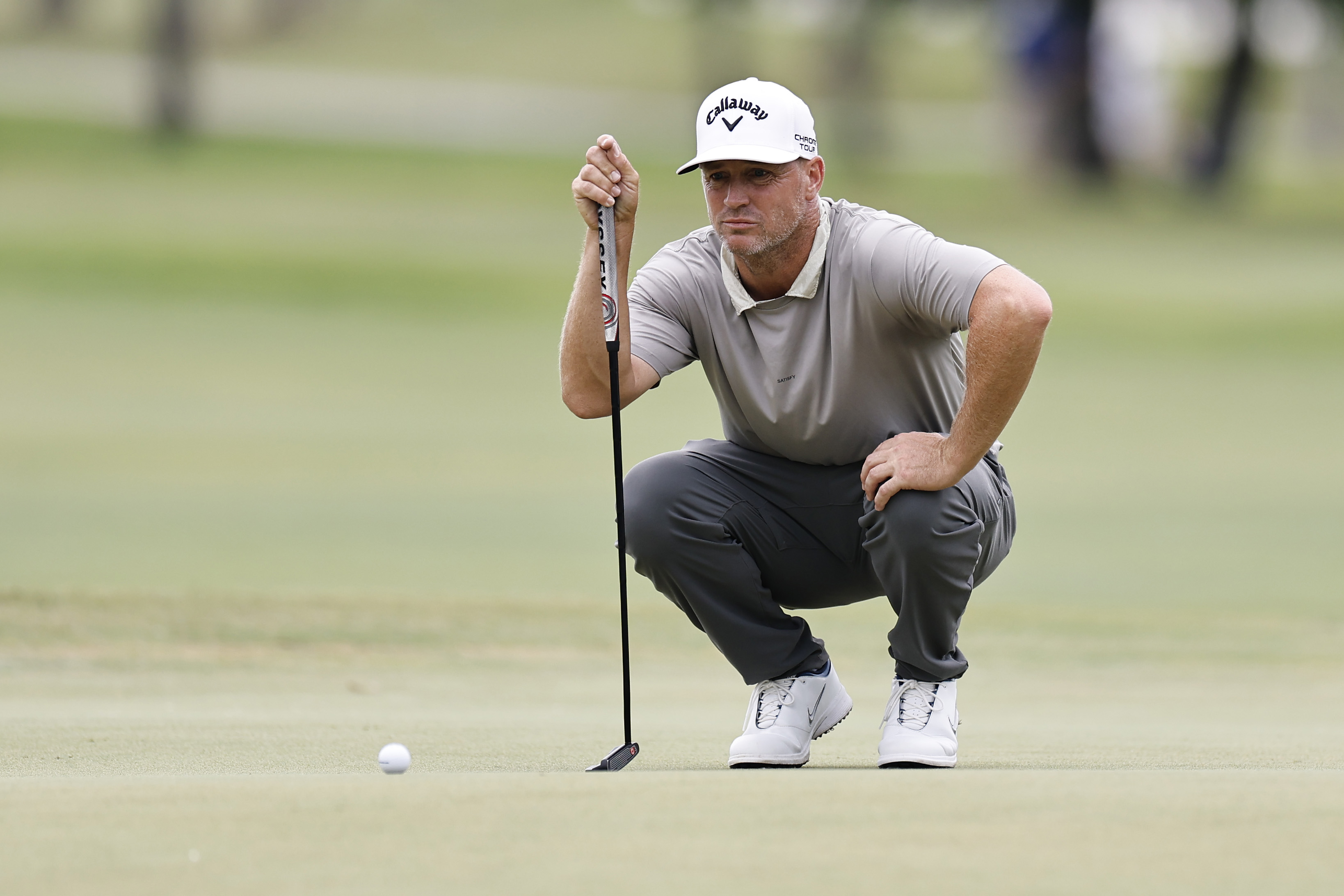 Alex Noren lines up a putt on the 11th green during the final round of the Cadillac Championship