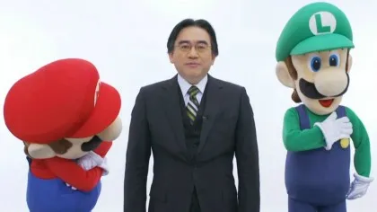 Iwata with Mario and Luigi