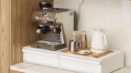 White Yamazaki Countertop Drawer styled with a Breville Espresso Machine and Fellow tea kettle atop of white marble kitchen countertop