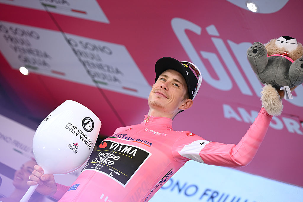 MILAN, ITALY - MAY 24: Jonas Vingegaard of Denmark and Team Visma | Lease a Bike celebrates at podium as Pink Leader Jersey winner during the 109th Giro d&amp;apos;Italia 2026, Stage 15 a 157km stage from Voghera to Milan / #UCIWT / on May 24, 2026 in Milan, Italy. (Photo by Dario Belingheri/Getty Images)