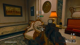 black ops 6 safe codes - a radio on an ornate table next to a chair.