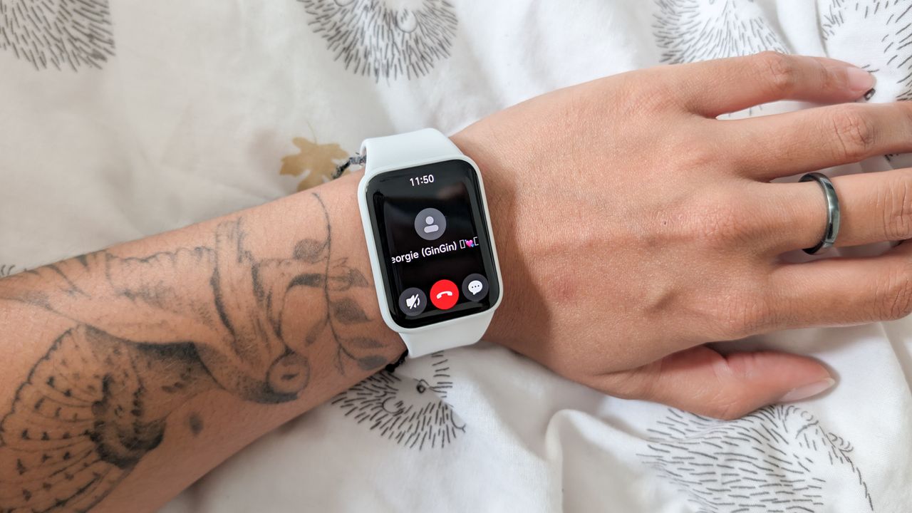 A person wearing a Xiaomi Smart Band 10 Pro smartwatch