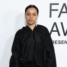 Rachel Scott of Proenza Schouler on a step and repeat