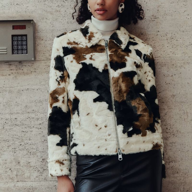 Faux Fur Cow Print Trucker Jacket on model 