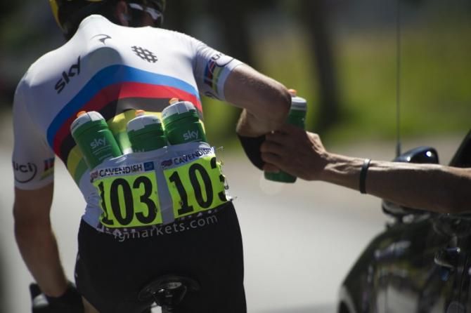 Not something you see everyday...World Champion Mark Cavendish on domestique duty during a hot stage of the Tour de France.