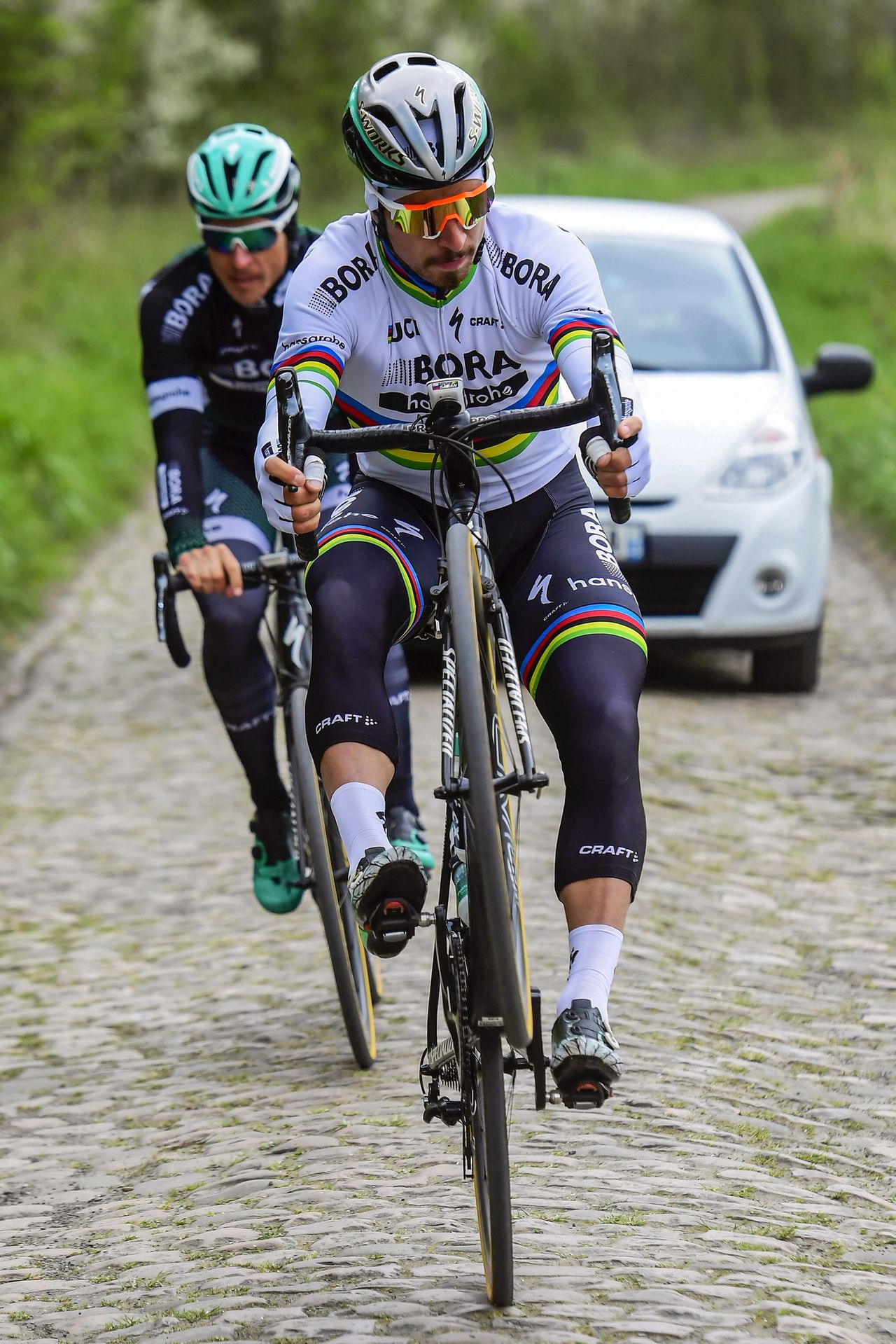 Peter Sagan takes time to pop a wheelie