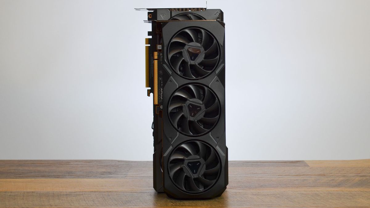 An AMD RX 7900 XT next to an Nvidia RTX 4070 Ti showing that the RX 7900 XT is slightly smaller
