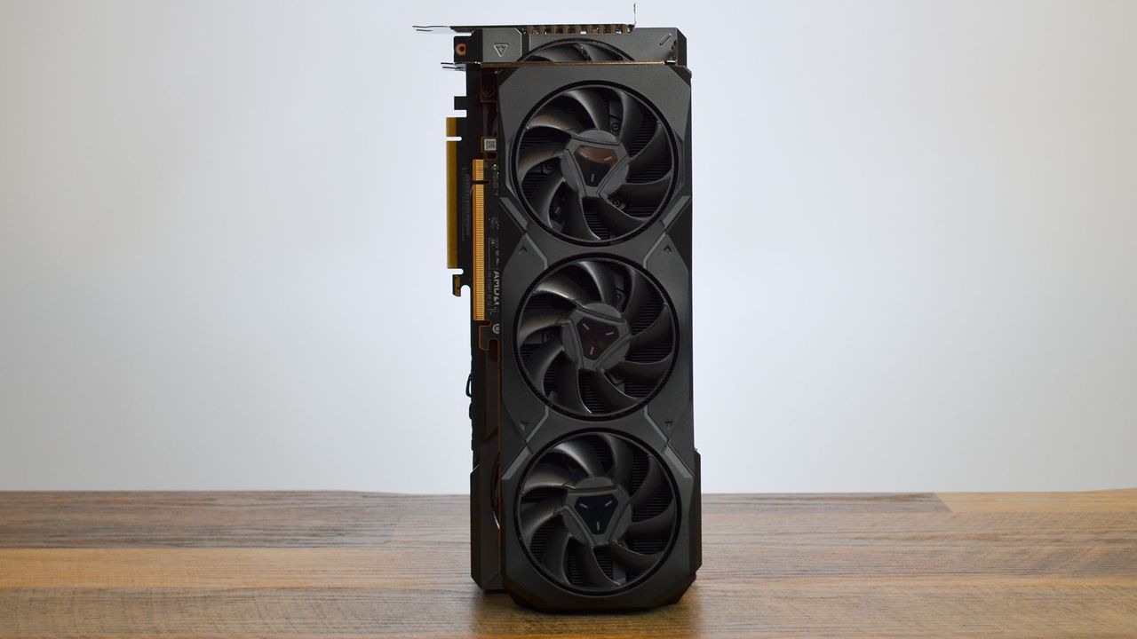 An AMD RX 7900 XT next to an Nvidia RTX 4070 Ti showing that the RX 7900 XT is slightly smaller