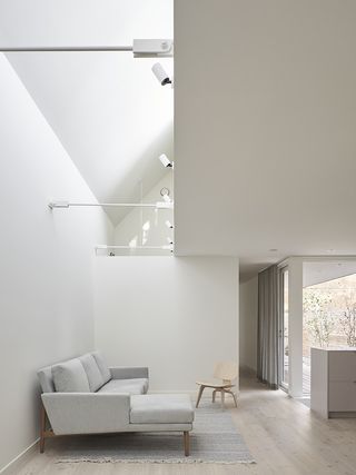 Anya Moryoussef's Craven Road Cottage white interior with skylight