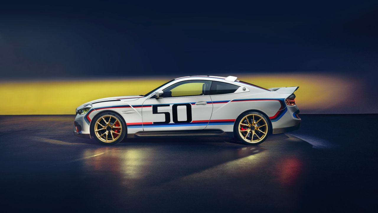 BMW 3.0 CSL car with racing stripes and &#039;50&#039; on the side