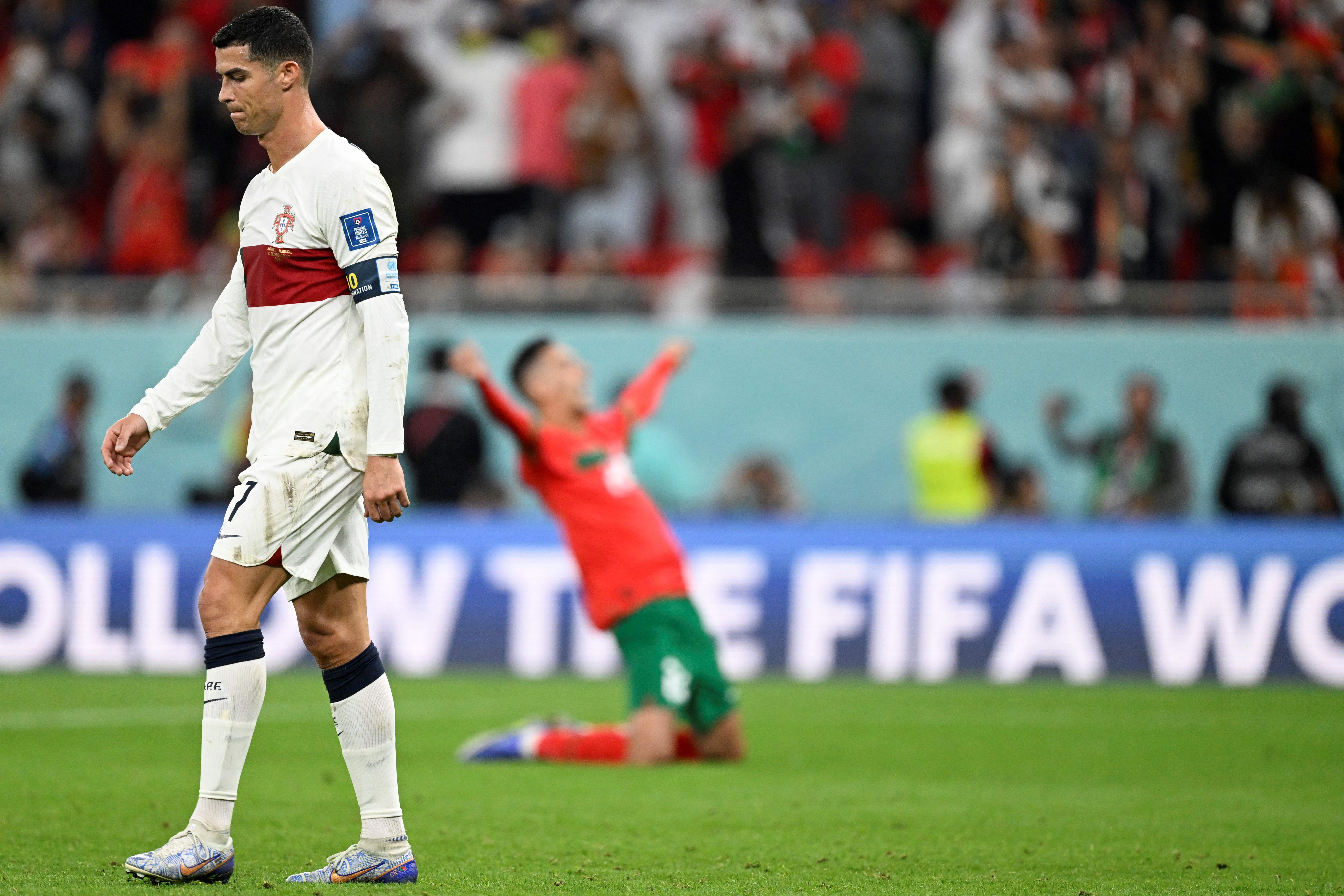 Portugal's Cristiano Ronaldo leaves the field after the World Cup defeat against Morocco