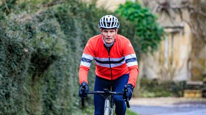 Simon Fellows riding a bike