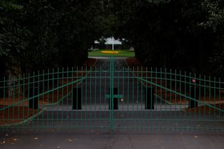 The gates of Augusta National and famous driveway; known as Magnolia Lane