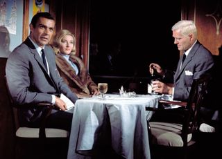 Grant, Tatiana and Bond share a meal in From Russia With Love.