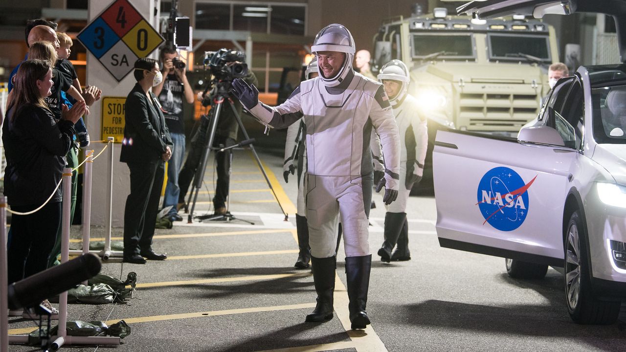 NASA astronauts Kjell Lindgren, Robert Hines, Jessica Watkins, and ESA (European Space Agency) astronaut Samantha Cristoforetti, wearing SpaceX spacesuits, are seen as they prepare to depart the Neil A. Armstrong Operations and Checkout Building for Launch Complex 39A to board the SpaceX Crew Dragon spacecraft for the Crew-4 mission launch, Tuesday, April 26, 2022, at NASA&rsquo;s Kennedy Space Center in Florida