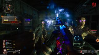 The Zombies mode in Call Of Duty: Black Ops 6: the player is surrounded by scary enemies while struggling to fend them off with a glowing gun