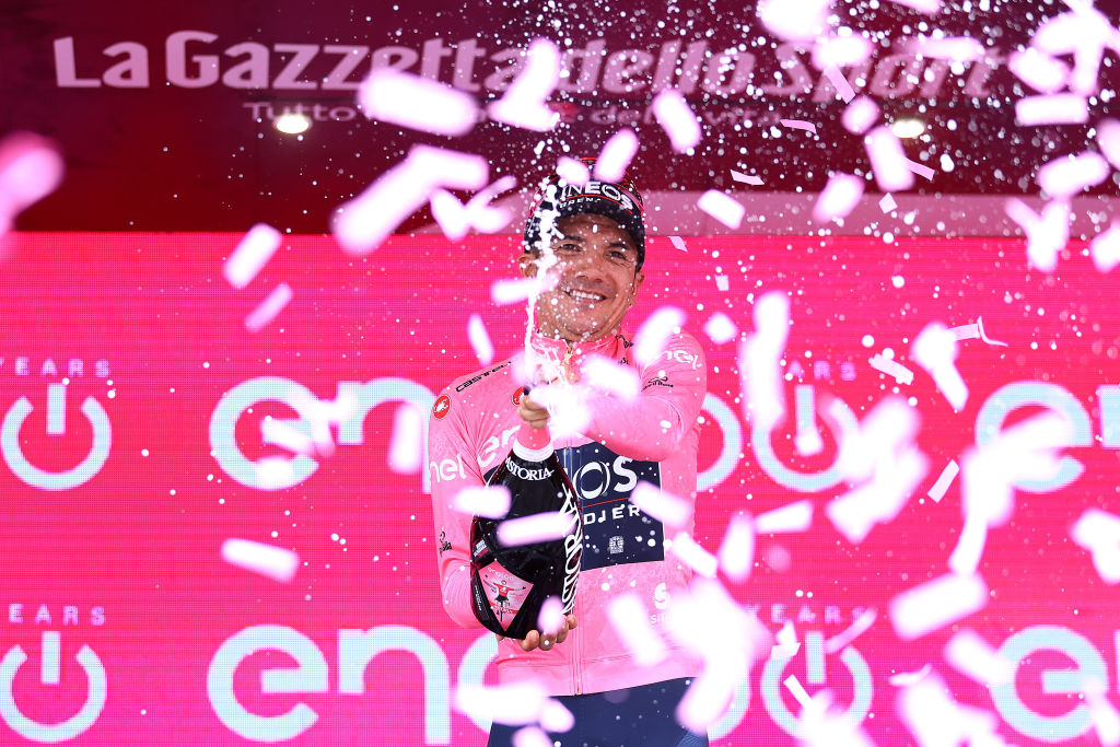 TREVISO ITALY MAY 26 Richard Carapaz of Ecuador and Team INEOS Grenadiers celebrates winning the pink leader jersey on the podium ceremony after the 105th Giro dItalia 2022 Stage 18 a 156km stage from Borgo Valsugana to Treviso Giro WorldTour on May 26 2022 in Treviso Italy Photo by Michael SteeleGetty Images