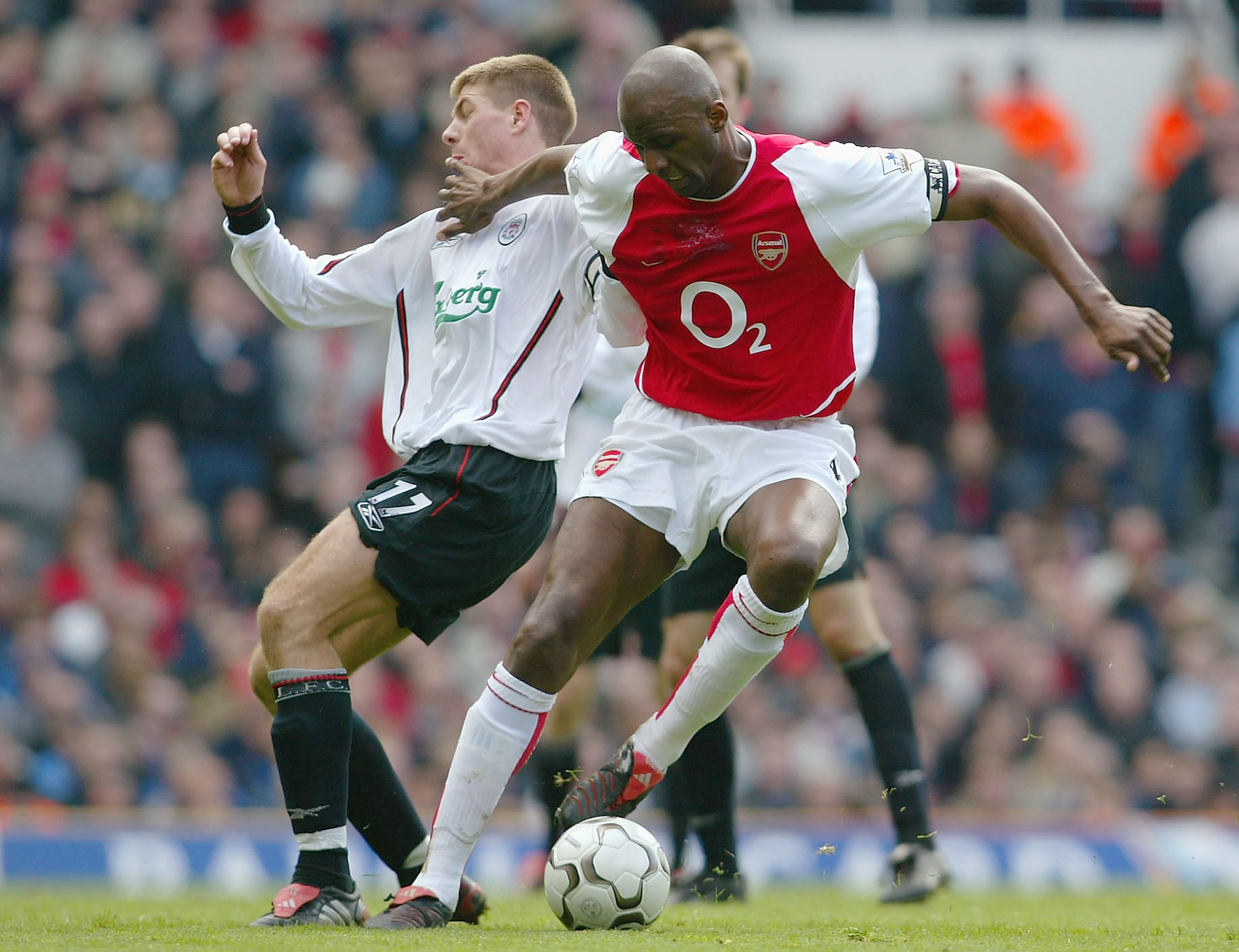 Patrick Viera of Arsenal battles for the ball with Steven Gerrard of Liverpool in 2004