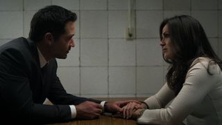 Manuel Garcia-Rulfo and Lana Parilla as Mickey and Lisa in an interrogation room in The Lincoln Lawyer season 2