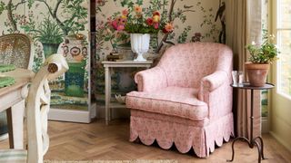 Upholstered armchair with scalloped-edge chair skirt