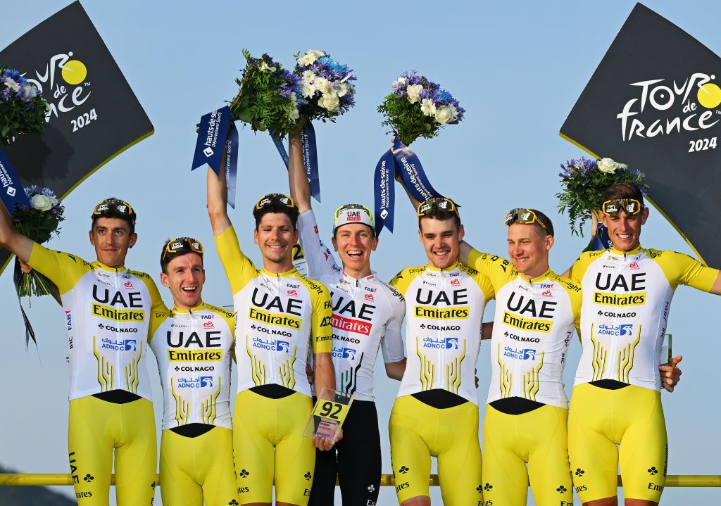 Tadej Pogačar and his UAE Team Emirates teammates on the final podium of the 2024 Tour de France in Nice