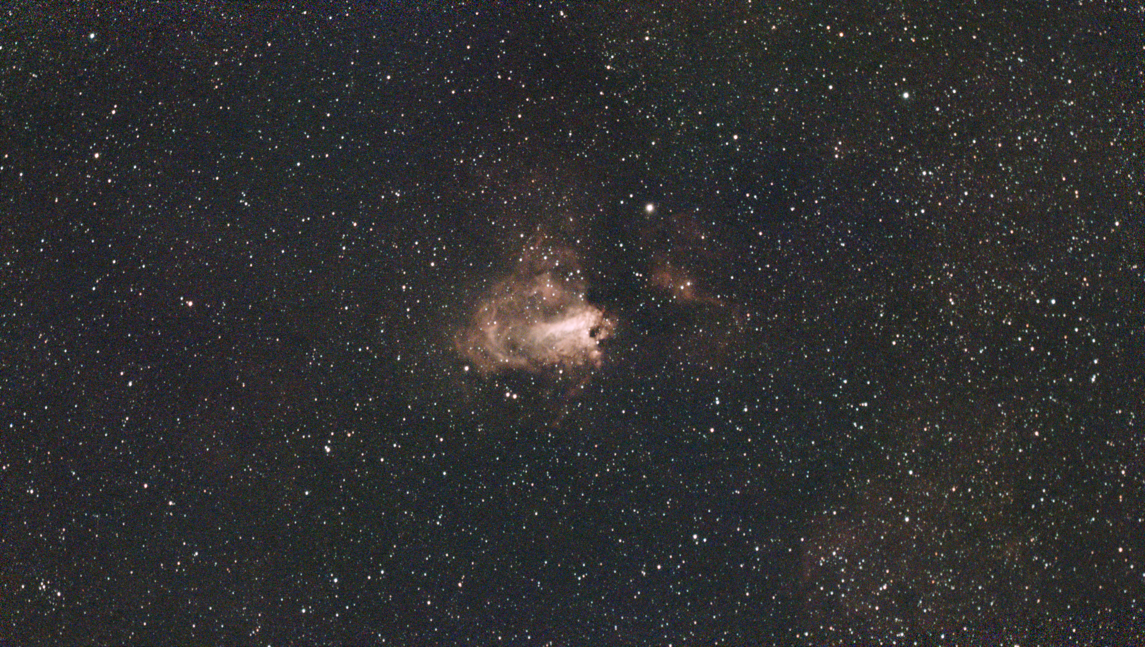 A photograph of the Omega Nebula taken with the Dwarf III smart telescope, unprocessed