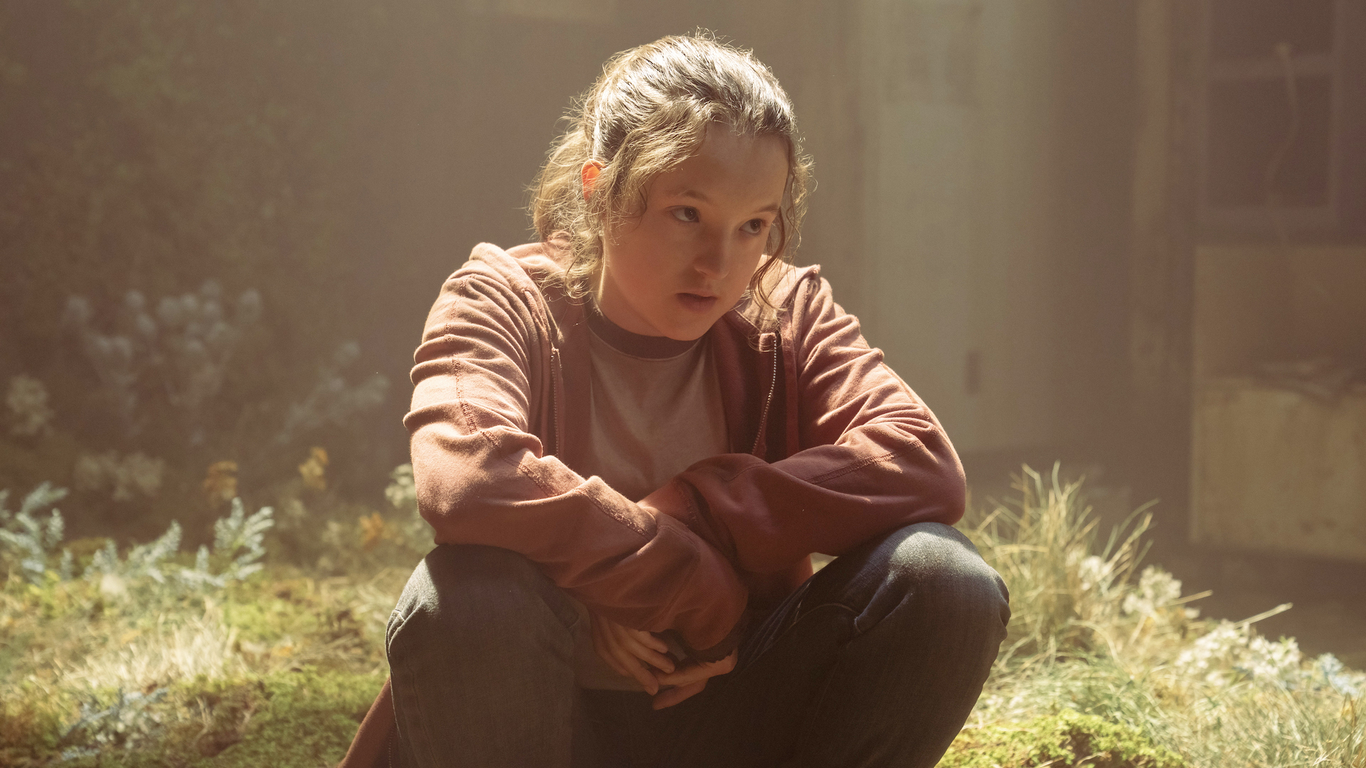 Bella Ramsey as Ellie, kneeling, in The Last of Us Episode 2 on HBO