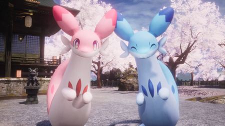 Palworld 1.0 launch trailer screenshot shows a Chillet Ignis and Chillet smiling at the camera, cherry blossom trees behind them.