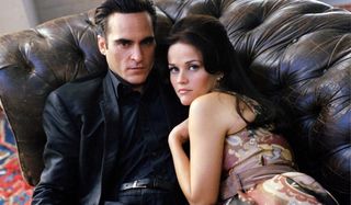 Walk The Line Joaquin Phoenix and Resse Witherspoon lie together on a couch